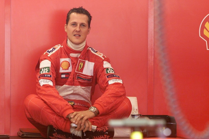 one person, lifestyles, s, Formula 1, occupation, protection, black, Michael Schumacher, men, firefighter, three quarter length, real people, front view