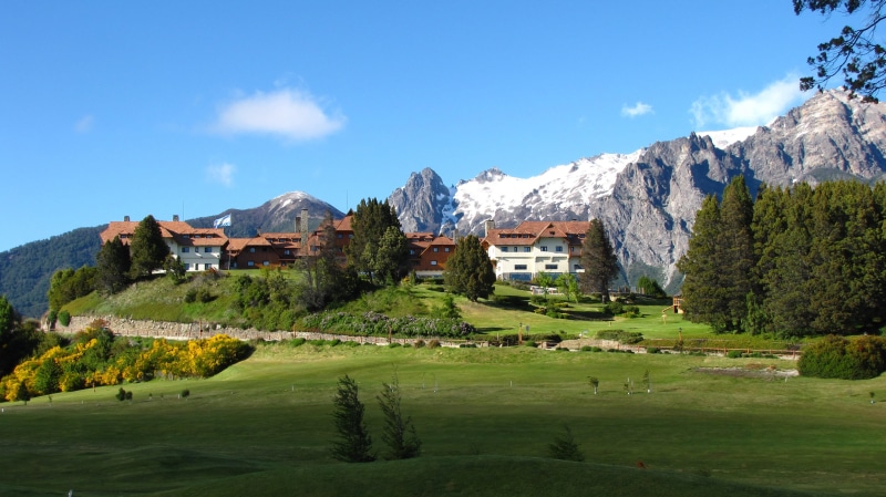 no people, tourism, views, scenics - nature, green color, built structure, mountain range, cloud - sky, plant, travel, patagonia, day, land, beauty in nature