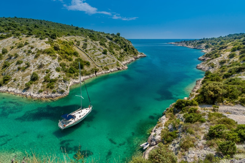travel Destinations, greece, sea, nautical vessel, island, anchored, mode of transportation, beauty In Nature, blue, coastline, mediterranean Sea, idyllic