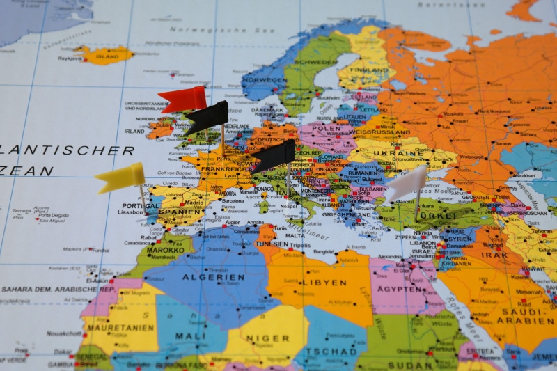 backgrounds, world map, physical geography, flag, world, guidance, flags and pennants, direction, country, travel, day, text, globe - man made object, indoors