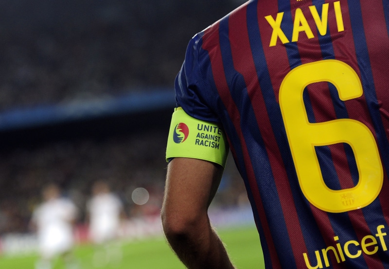 competition, Barcelona, 2K, football, Captain, jersey, human limb, Chavis, protection, yellow, Xavi Hernandez, body part, striped, sign, safety, blue
