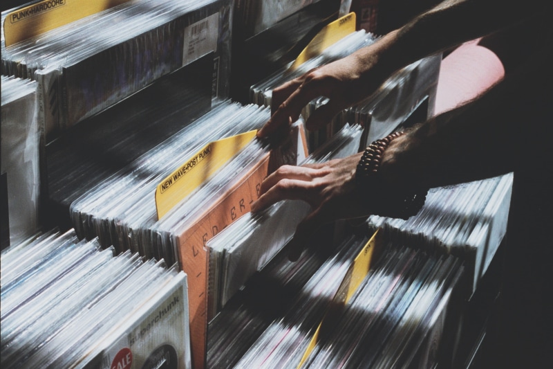indoors, 35mm film, music lover, piano, rack, shelf, photo, human hand, vynil, retro, close-up, unrecognizable person, hand, looking, assorted, human body part