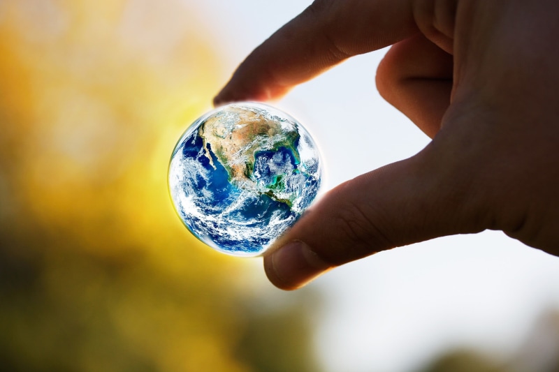 outdoors, care, miniatures, toy, 1080P, space, marble, finger, transparent, blue, fingers, globe - man made object, symbols, human finger, one person