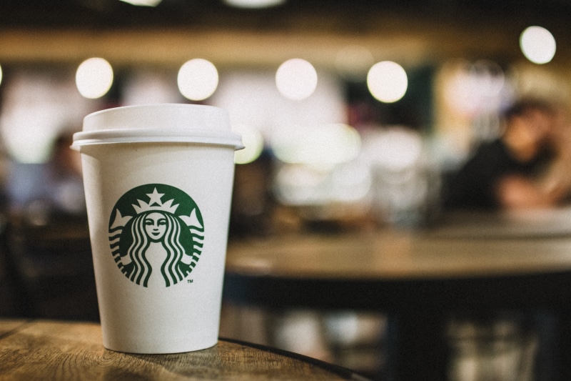 close, no people, latte, disposable, container, crockery, close-up, wood, non-alcoholic beverage, mug, focus on foreground, cafe, blur, hipster, 5K, floral pattern