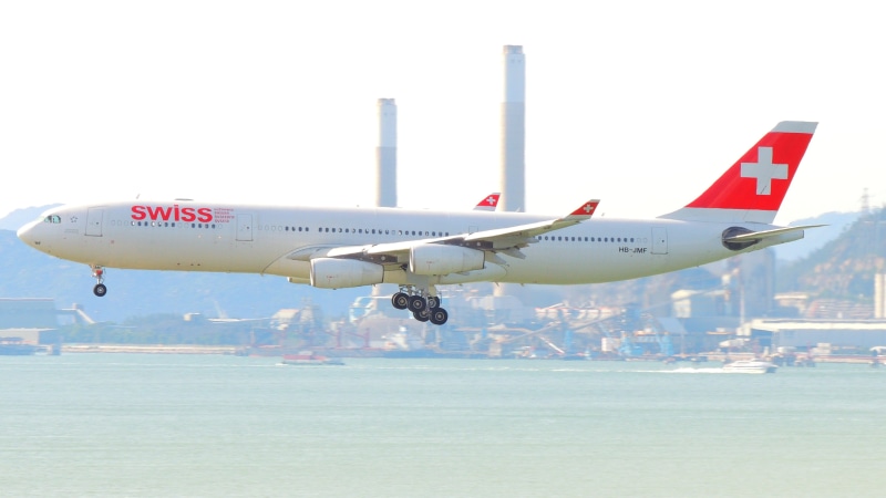 air, aerial, building, airline, architecture, fast, urban, sea, motion, journey, vacation, fly, 4K, plane, sky, swiss, travel, hong, departure, passenger