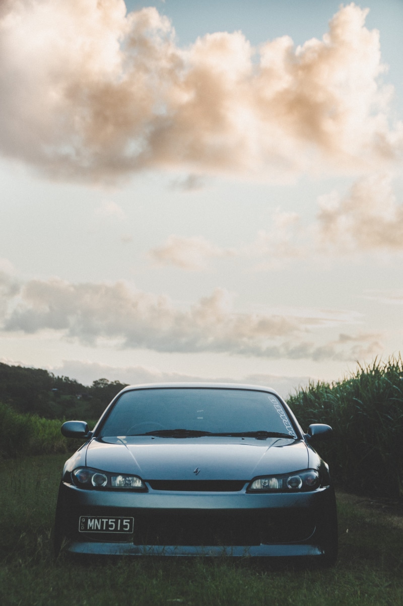 road, mode of transportation, cloud, road trip, sedan, parked, park, 5K, no people, vehicle, tree, transportation, motor vehicle, car, environment, field