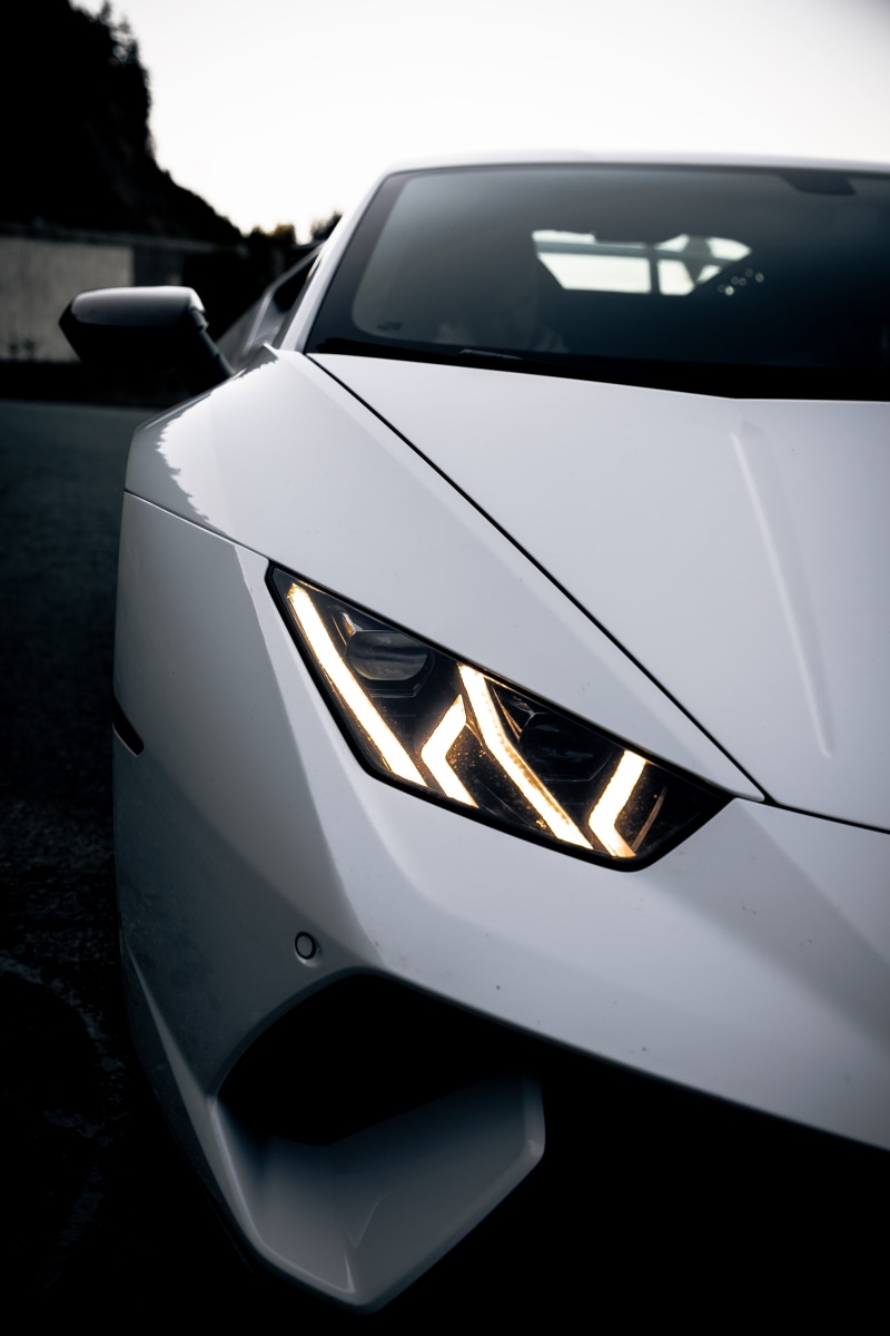 vehicle part, headlight, tire, logo, exotic cars, glass - material, nature, trademark, cars, mode of transportation, no people, canada, light, symbol, travel