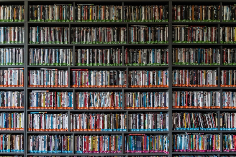 abundance, arrangement, book, large group of objects, this book is, rent, full frame, repetition, no people, shelf, movies, side by side, reading, backgrounds