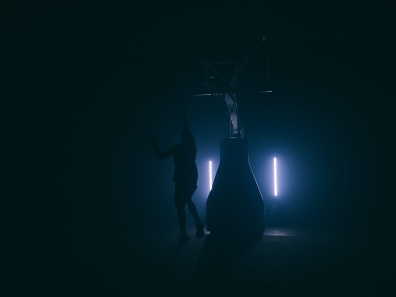 leisure activities, quasar science, back lit, illuminated, medium format, room, basketball, performing arts event, dimmed, dark, indoors, people, cine