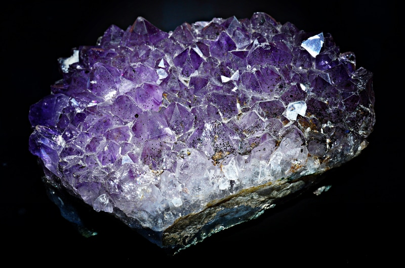 natural condition, black background, single object, solid, indoors, quartz, jewelry, amethyst, harmony, rock, crystal, textured, semi-precious gem, precious gem
