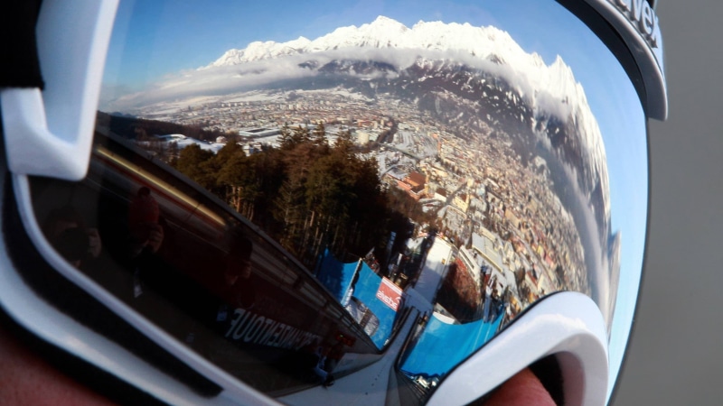 real people, glass - material, people, mode of transportation, sports, ski jumper, mountain, reflection, city, day, women, transportation, lifestyles, group of people