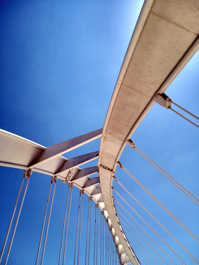 sunlight, rope, construction, business, bridge, barcelona, engineering, day, road, connection, sailboat, path, architecture, sport, blue, polygons, suspension bridge