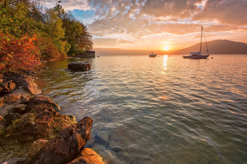 hills, rock, sunset, landscape, orange color, water, tranquil scene, sky, gameplay, nautical vessel, tranquility, mode of transportation, transportation