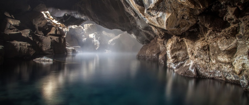 rock, physical geography, ultra-wide, outdoors, nature, scenics - nature, waterfront, non-urban scene, reflection, black, textile, water, rock formation