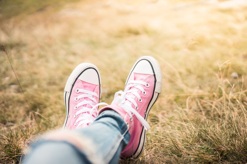 selective focus, human Leg, shoe, walking, females, body part, fashion, men, human Foot, personal perspective, people, lifestyles, low section, field, Meadow