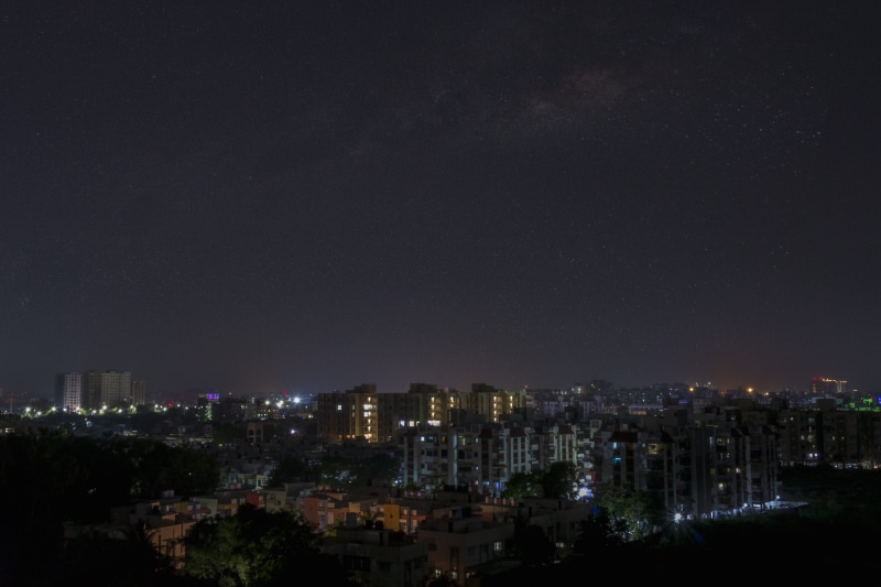 outdoors, building exterior, built structure, no people, sky, skyscraper, copy space, nature, astrophoto, stars, nightsky, office building exterior, cityscape