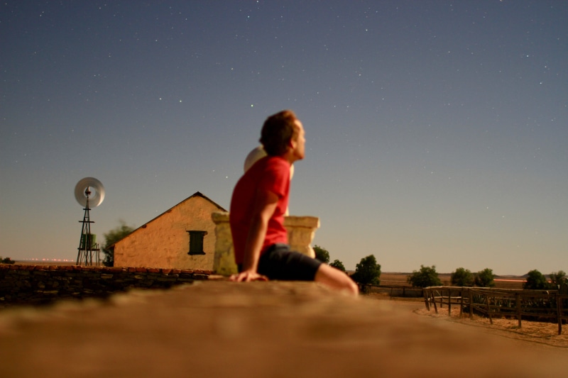 clear sky, 5K, gaze, focus on background, sitting, human, karoo, selfie, lifestyles, countryside, long exposure, space, starry sky, sky, full length, side view