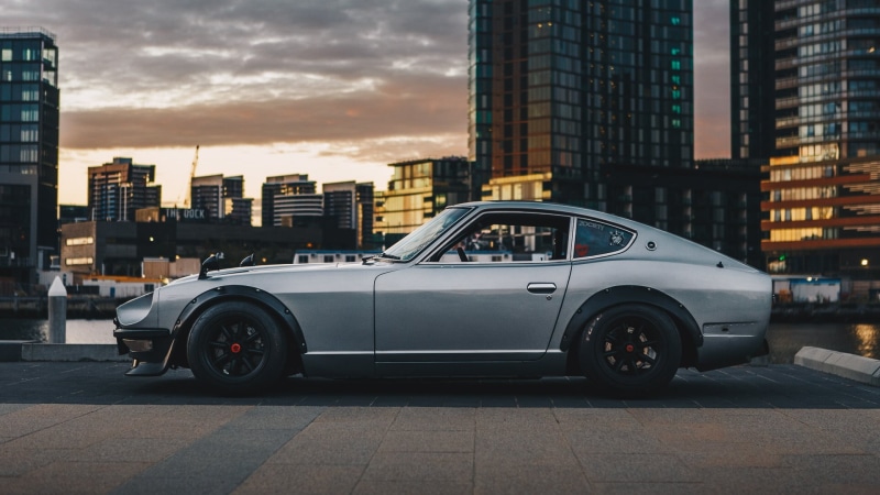 Japanese cars, Nissan, JDM, Nissan S30, car, Datsun 240Z, vehicle, sports car, skyscraper, Datsun, Nissan Fairlady Z, city, silver cars, 1080P