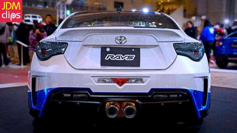 car, focus on foreground, Toyota, street, day, taxi, JDM, architecture, transportation, police force, law, police car, incidental people, mode of transportation