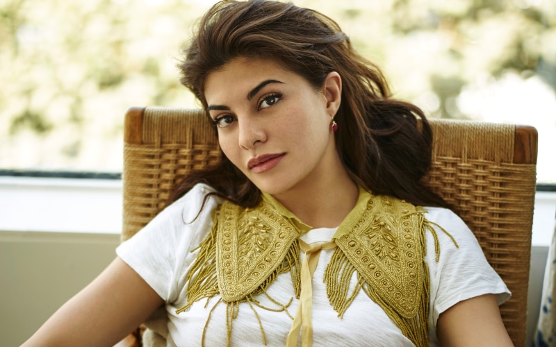 looking at camera, focus on foreground, one person, leisure activity, teenager, front view, Jacqueline, contemplation, hairstyle, portrait, sitting, real people