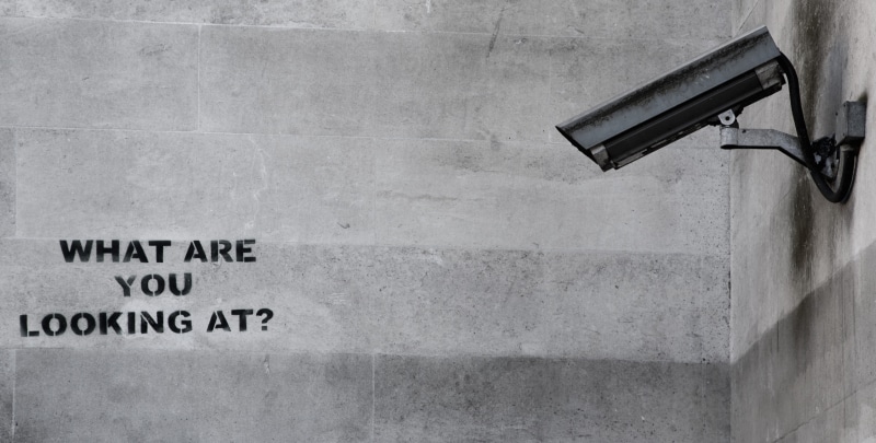 built structure, graffiti, building exterior, day, message, no people, security camera, architecture, wall, western script, technology, surveillance, sign