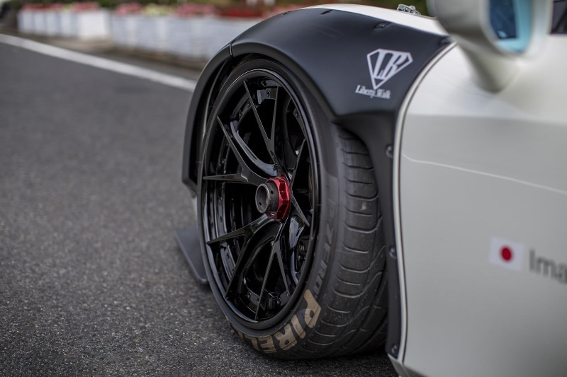 focus on foreground, Ferrari 458 Italia, wheels, outdoors, Ferrari, vehicle part, land vehicle, mode of transportation, sign, 1080P, no people, motor vehicle