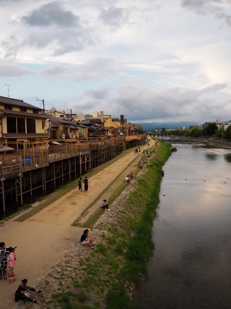 green, water, built structure, land, tree, cloud - sky, nature, kyoto, incidental people, footpath, travel, sky, architecture, japan, plant, gion, river