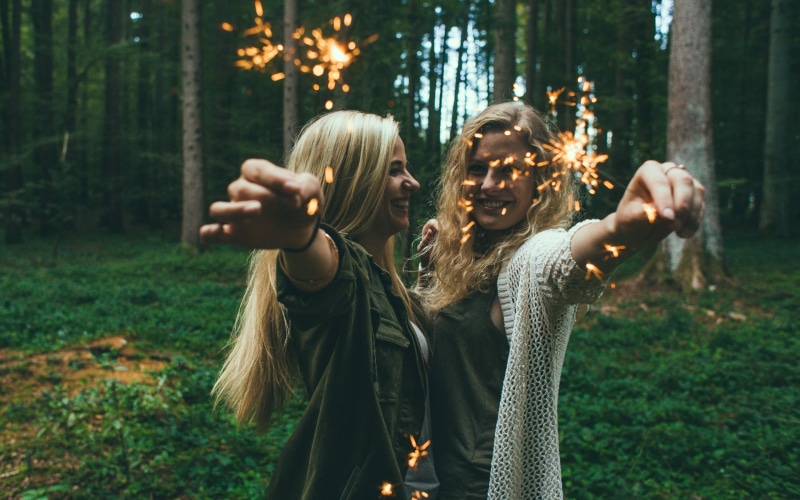 burning, bonding, leisure activity, tree, forest, real people, positive emotion, land, teenager, togetherness, trees, young adult, happiness, two people