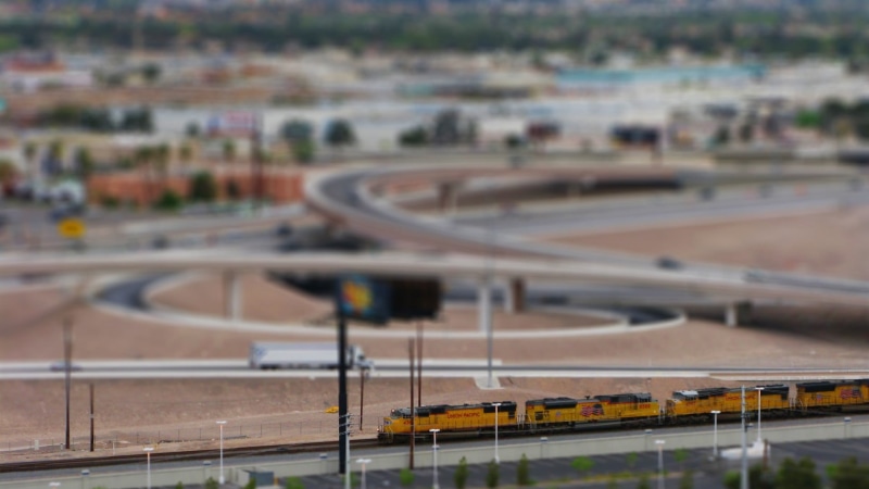 town, diesel locomotive, rail transportation, yellow, landscape, land vehicle, 1080P, transportation, sports Venue, multiple lane highway, sports Track