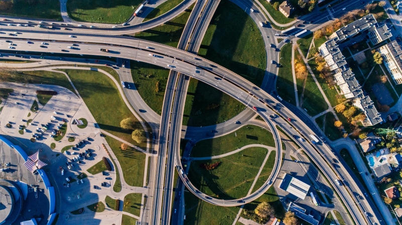 drone, architecture, 5K, roof, europe, car, highway, outdoors, overpass, street, tourism, sunny day, transportation, urban, building exterior, day, aerial