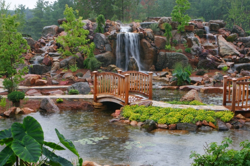 flowing, waterfall, bridge, rock, bridge - man made structure, connection, tree, solid, water, scenics, travel Destinations, rain, garden, rock - Object