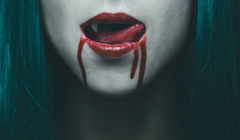one person, real people, close-up, person, human mouth, woman, black background, beautiful woman, mouth open, vampire, human lips, midsection, lipstick