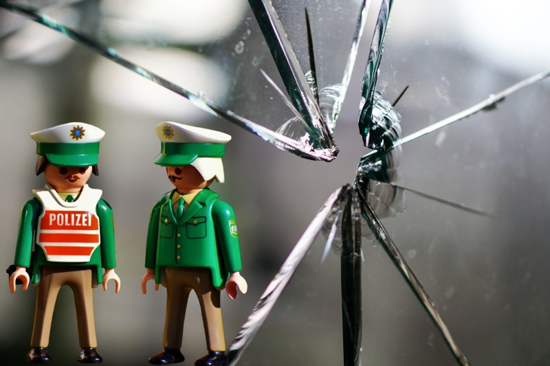 front view, glass damage, togetherness, window pane, disc, people, technology, structure, green, playmobil, headwear, old, crime, broken, fragmented, cooperation