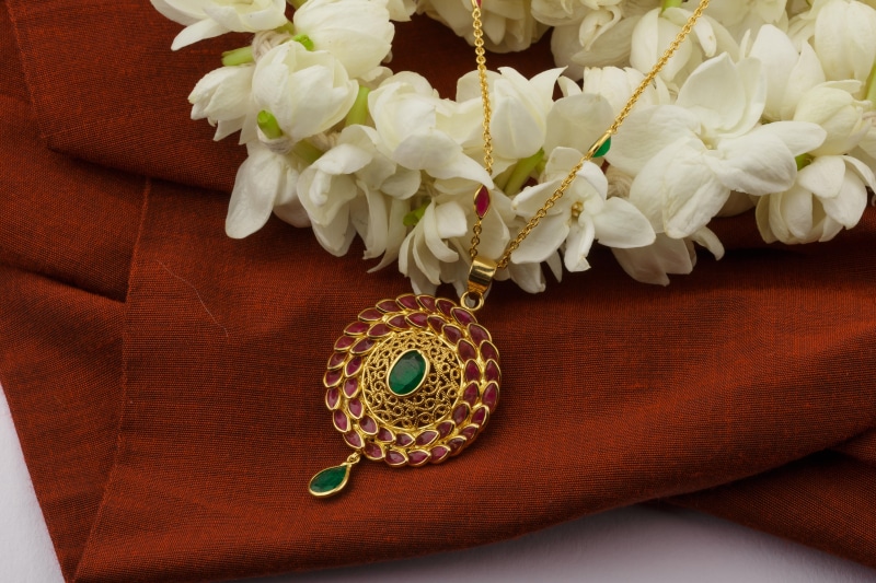 no people, luxury, brown, fashion, medallion, plant, flower arrangement, flower, colored, top, flowering plant, jewel, pendant, jewellery, pendant chain