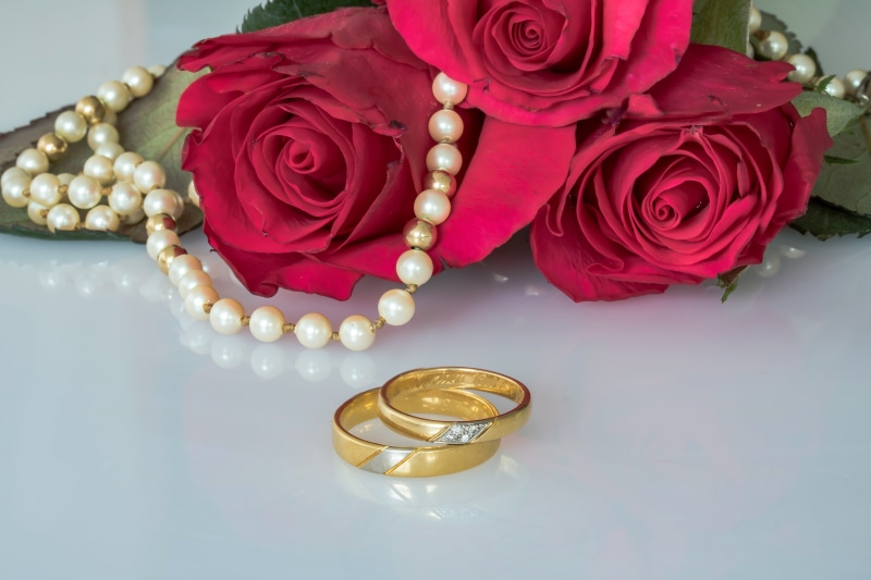 oath, near, pearl jewelry, rings, scratches on rings, together, string pearl necklace, beauty in nature, wealth, personal accessory, flower head, diamond - gemstone