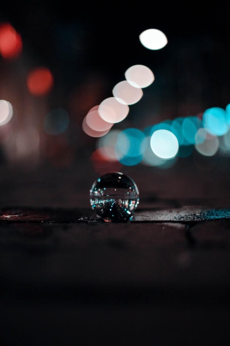 5K, decoration, lights, no people, glass ball, defocused, photo, selective focus, table, crystal ball, lighting equipment, reflection, nightlife, focus