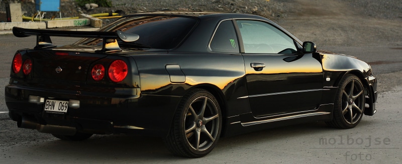 Nissan Skyline R34, taxi, car, transportation, tire, mode of transportation, stationary, city, no people, motor vehicle, personal land vehicle, street