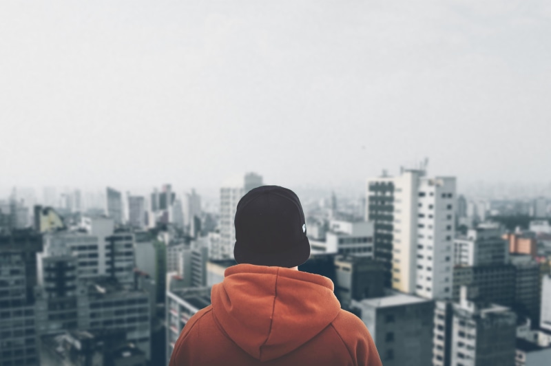 cityscape, hood - clothing, alone, day, buildings, skyscraper, contemplation, urban, landscape, clothing, headshot, rear view, men, outdoors, business