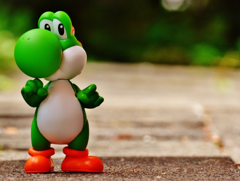 nintendo entertainment system, small, cartoon, standing, cute, focus on foreground, marios brother luigi, super mario bros, human representation, mushroom-kingdom