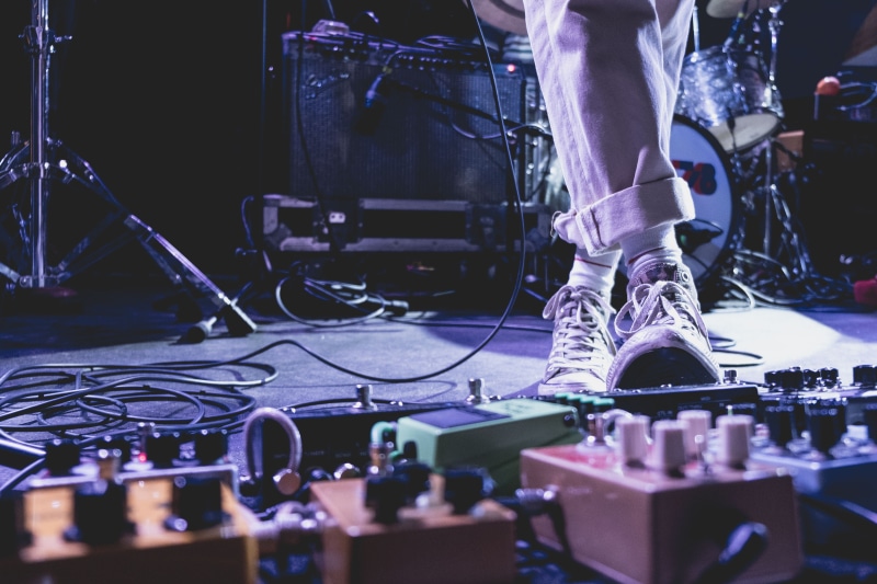 electric guitar, standing, artist, drummer, apparel, jeans, live music, 4K, crowd, dj, clothing, music, indoors, musical equipment, stepping, band, concert