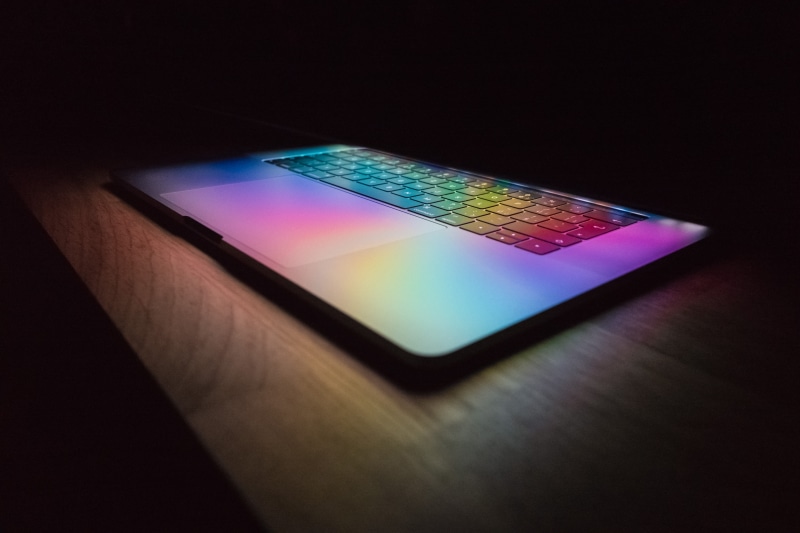 apple, laptop, studio shot, single object, table, communication, accessibility, connection, light beam, colorfull, cyberspace, desk, wood, color, science