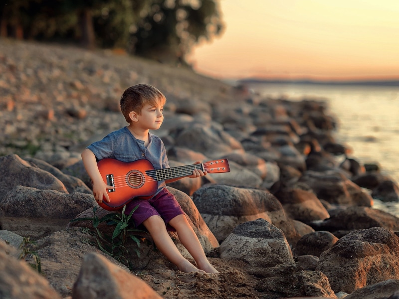 boy, Victoria Dubrovskaya, nature, stones, guitarist, child, 1080P, shore, guitar