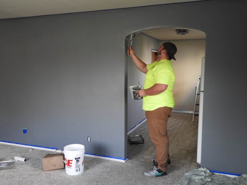 pants, reflective clothing, person, lifestyles, house, rear view, full length, wearing, profession, adult, man, technology, entrance, painter, worker, paint