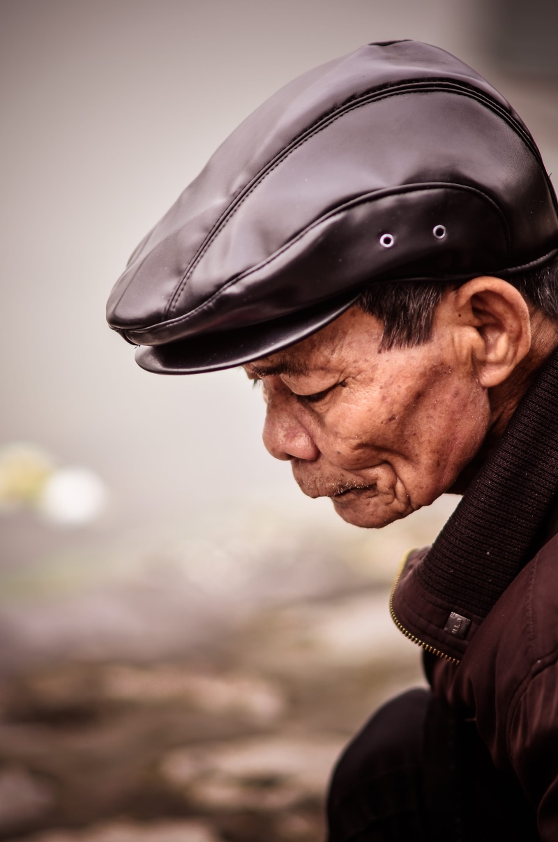 portrait, photography, crash helmet, person, man, senior adult, performer, head, hat, clothing, hardhat, males, finger, men, protection, street, lifestyles