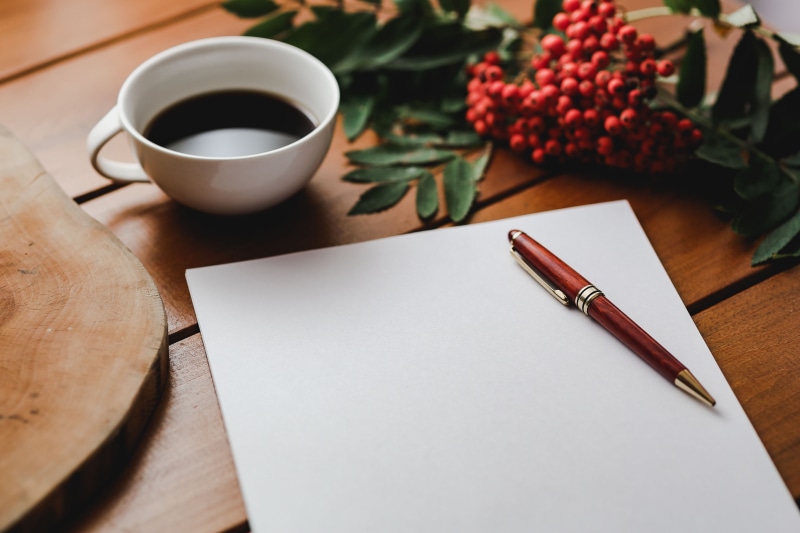 tea cup, writing instrument, white, coffee - drink, refreshment, high angle view, sheet, pencil, wood - material, cup, drink, table, mug, food and drink