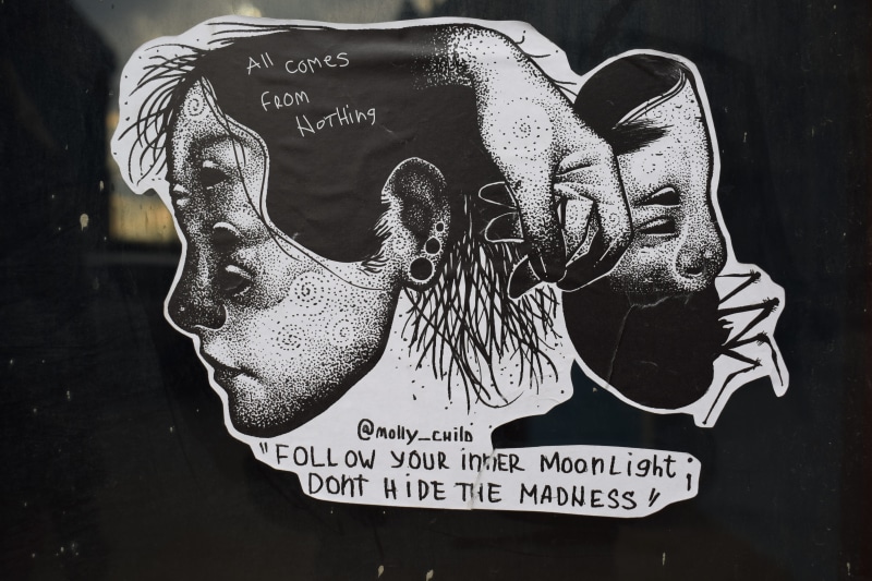 human, message, drawing, text, warning sign, art, bone, clothing, human representation, poster, paper, graffiti, head, communication, label, advertisement