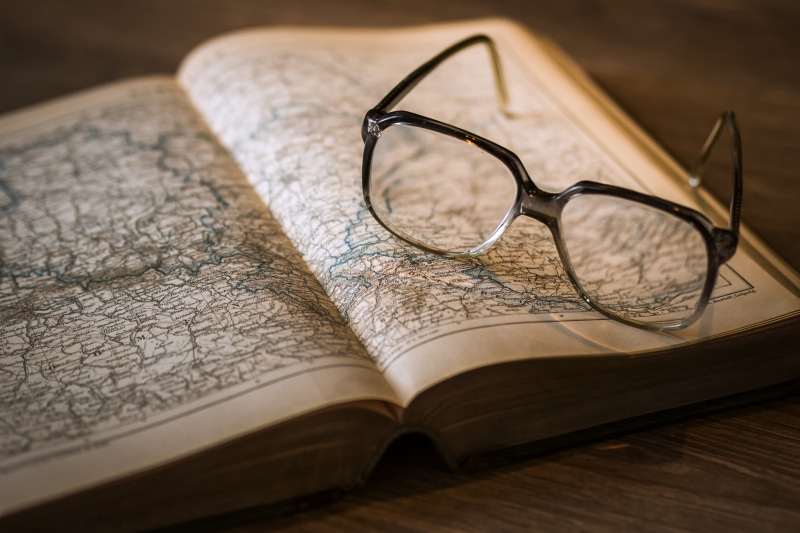 publication, open book, learning, table, old, library, reading, paper, studying, glasses, literature, close-up, various, maps, indoors, no People, books