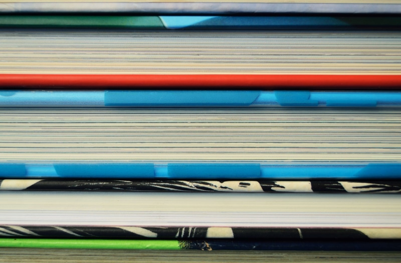 paper, knowledge, no people, day, indoors, background, learn, science, in a row, page, transportation, study, blue, object, high angle view, library, learning