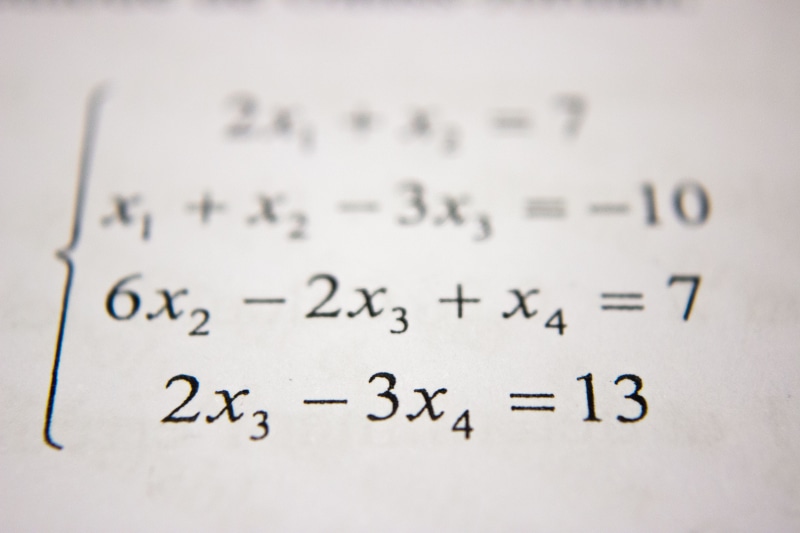 symbol, close-up, message, document, math, letters, solution, exam, handwriting, mathematics, indoors, complexity, education, plus sign, black and white