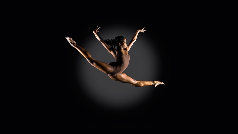 arms raised, indoors, human limb, performance, mid-air, sport, splits, full length, agility, leotard, limb, hairstyle, women, elegance, 1080P, one person
